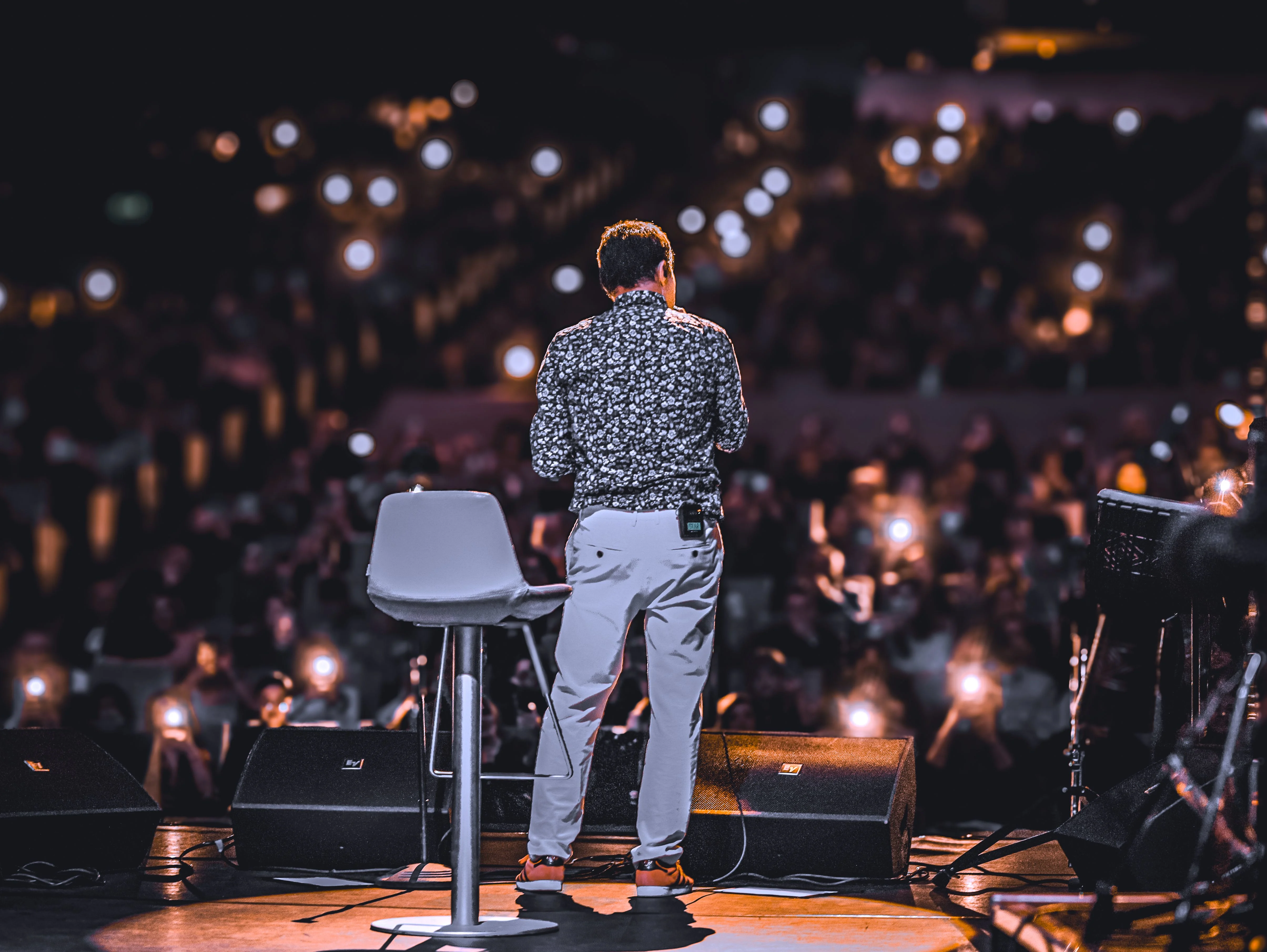 Conference keynote speaker on stage
